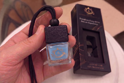 Wild Sauvage diffuser detail — long-lasting bergamot fragrance oil, luxury car perfume